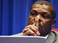 Superintendent John Covington listens to citizens during a meeting of the Kansas City School Board, Wednesday, March 10, 2010, in Kansas City, Mo. The Kansas City school board voted to close nearly half the district's schools in a desperate bid to stay afloat. (AP Photo/Ed Zurga)