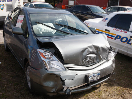 A 2005 Toyota Prius, which was in an accident, is seen at a police station in Harrison, New York, Wednesday, March 10, 2010. The driver of the Toyota Prius told police that the car accelerated, lurched down a driveway, across a road and into a stone wall. (AP Photo/Seth Wenig)