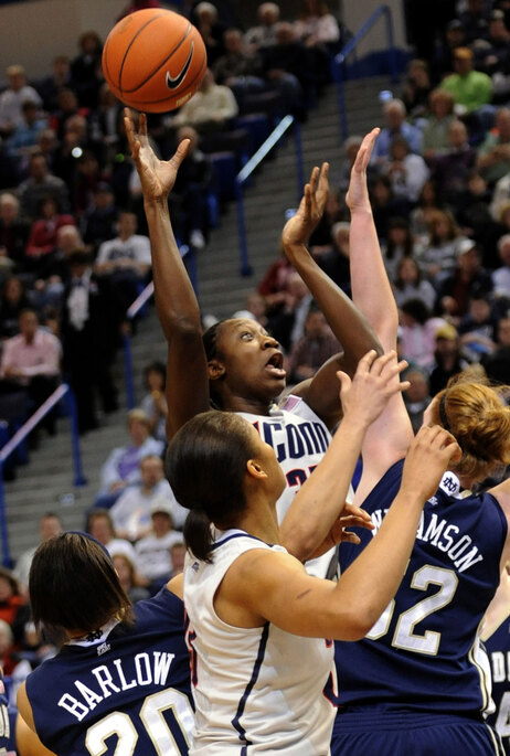 The University of Connecticut women's basketball team won its 71st straight game, setting a new for women's basketball by breaking its own former record.
