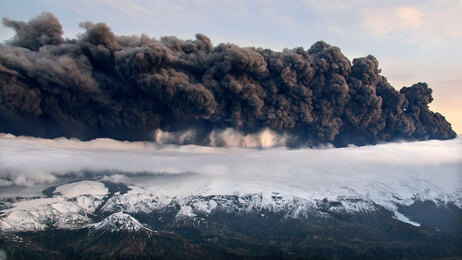 Smoke and steam hangs over the volcano under the Eyjafjallajokull glacier in Iceland, Wednesday April 14, 2010. (AP Photo/Jon Gustafsson)