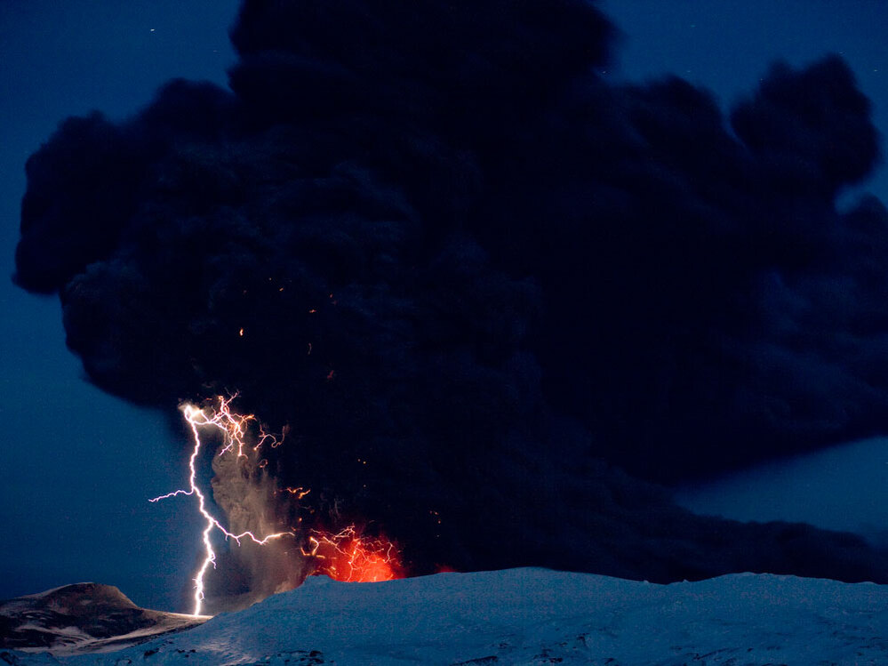 Lighting seen amid the lava and ash erupting from the vent of the Eyjafjallajokull volcano in centra