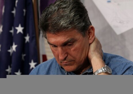 West Virginia Governor Joe Manchin participates in a news conference where he told reporters that the four missing miners were found dead by rescuers at the Upper Big Branch Mine on April on April 9, 2010 in Montcoal, West Virginia. (Photo by Mark Wilson/Getty Images)