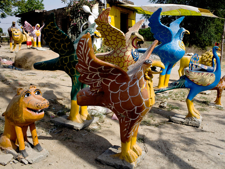 A statue shop on the side of the Grand Trunk Road on the outskirts of Amritsar. Wealthy Punjabis purchase these statues as a sign of prosperity and place them on the roofs of their homes. (Kainaz Amaria for NPR)