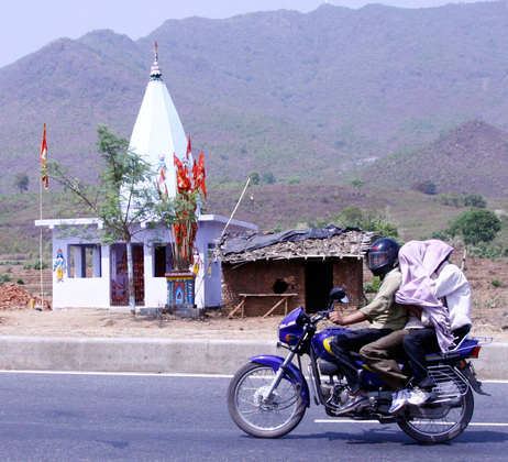 A Hindu Temple, festooned with flags, on the Grand Trunk Road outside Kolkata. (Nishant Dahiya/NPR)
