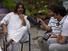 NPR producer Tom Bullock in Mohib Banda, Pakistan, interviewing village elders about Times Square bo NPR producer Tom Bullock in Mohib Banda, Pakistan, interviewing village elders about Times Square bo