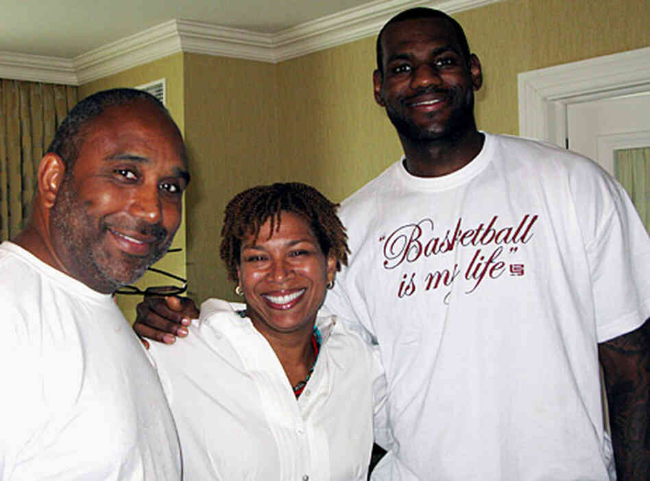 Host Michel Martin (center) poses with NBA star LeBron James of the Cleveland Cavaliers (right) and Host Michel Martin (center) poses with NBA star LeBron James of the Cleveland Cavaliers (right) and