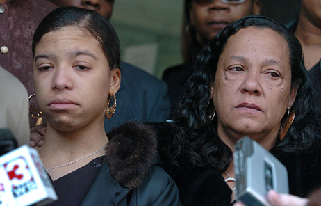 Megan Williams, left, and her mother Carmen Williams (now deceased) stand outside of the Logan County Courthouse in March 2008 in West Virginia. Karen Burton and Frankie Brewster were sentenced for kidnapping and sexual assault of Megan Williams. Brewster and Burton were among seven white Logan County residents who were charged in the Williams case. Authorities say Williams was held captive for several days in 2007 at Brewster's trailer home.