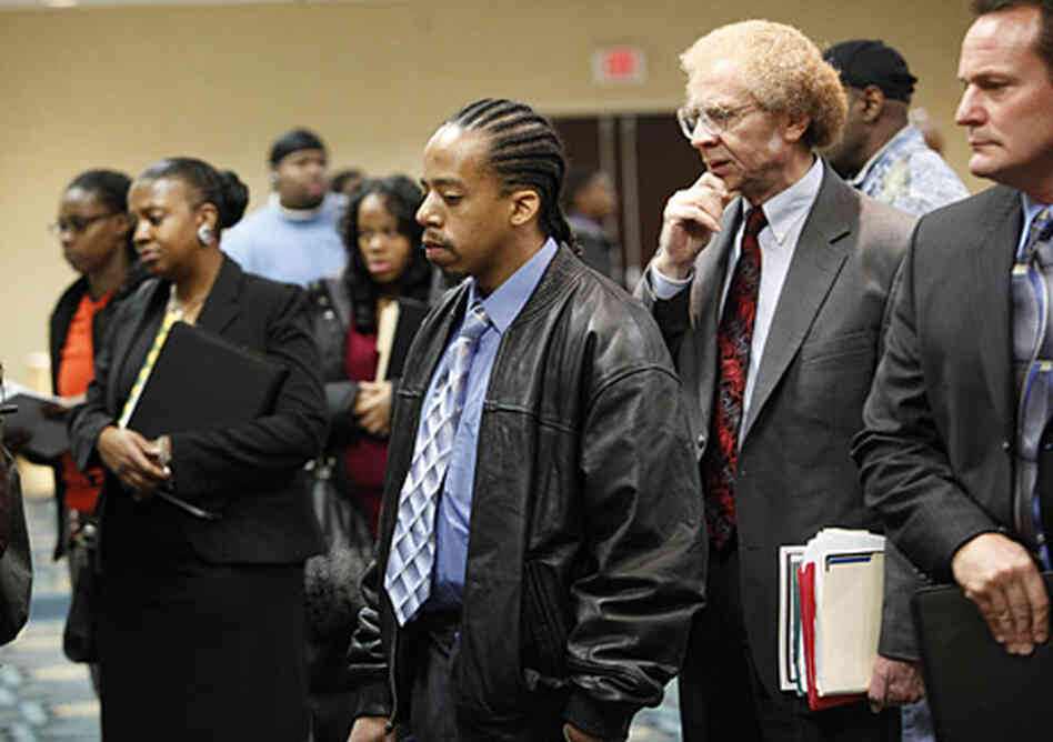 Job seekers wait to speak to potential employers at a job fair in Philadelphia. The unemployment rat Job seekers wait to speak to potential employers at a job fair in Philadelphia. The unemployment rat