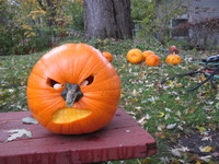Pumpkin carved to look like Dick Cheney.