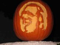 Pumpkin carved to look like Jerry Garcia.