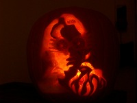 Pumpkin carved to look like Luna Lovegood.