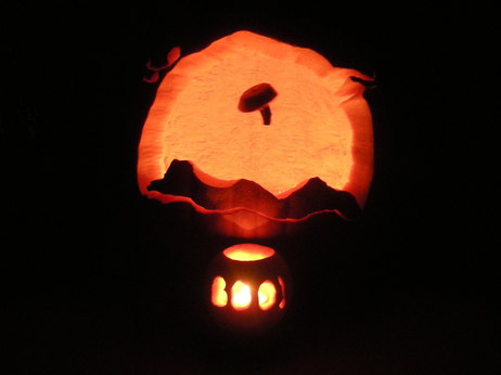 Image of pumpkin carved to look like balloon boy.