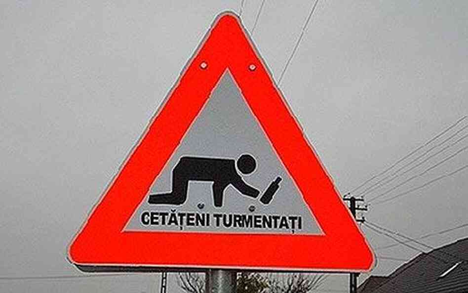 Image of Romanian drunk crossing sign. Image of Romanian drunk crossing sign.
