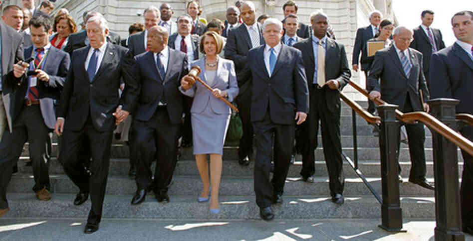 Photo of Nancy Pelosi and house members. Photo of Nancy Pelosi and house members.