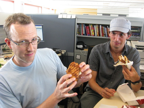 Mike and Ian eat the new KFC sandwich.