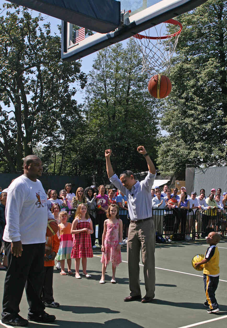 President Obama plays basketball. President Obama plays basketball.