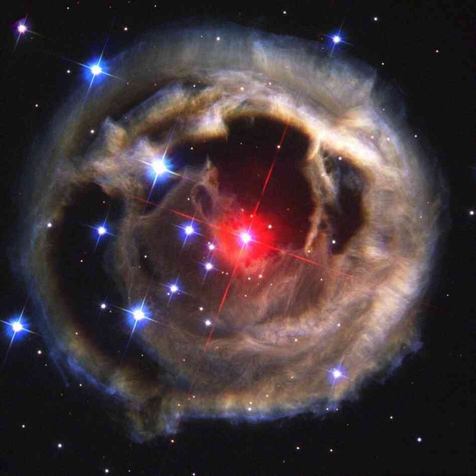 Light echoes from red supergiant star V838 Monocerotis in the constellation Monoceros, or the Unicorn, in December 2002.