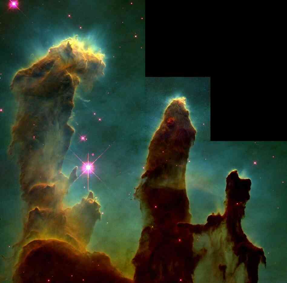 Dubbed Mountains of Creation by Spitzer scientists, these towering pillars of cool gas and dust are illuminated at their tips with light from warm, embryonic stars.  The pillars in this Spitzer image are part of a region in the Cassiopeia constellation located 7,000 light-years away.
