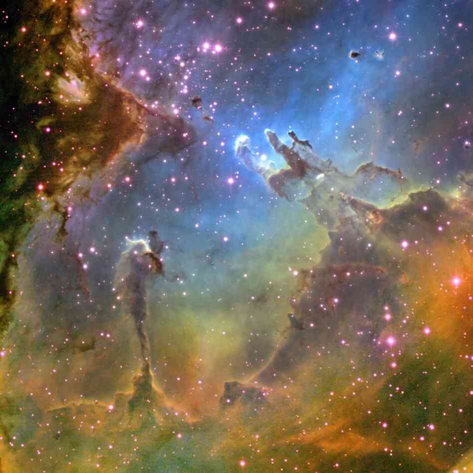 This Hubble image shows the Eagle Nebula, a young cluster of stars in the constellation Serpens.
