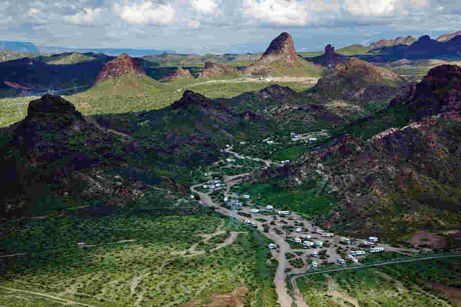 Recreational trailers appear to spill out of the hills near Lake Havasu, north of Lake Havasu City, Ariz.