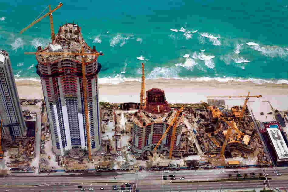 Despite the destructive hurricanes and rising sea levels that have hit the Sunny Isles community in Florida, developers continue to build close to the shoreline. Trump Towers Miami is one of many high-rise structures going up on the coast between Fort Lauderdale and Miami.