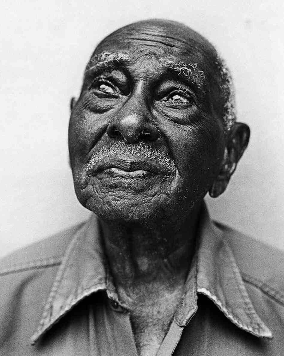 Walter Jackson is 104 years old. He grows citrus in Vero Beach, Fla. Mobley says that during the project he asked anyone over 100 about the key to long life. Jackson looked to the sky and said something like, "The dear Lord has been good to me."