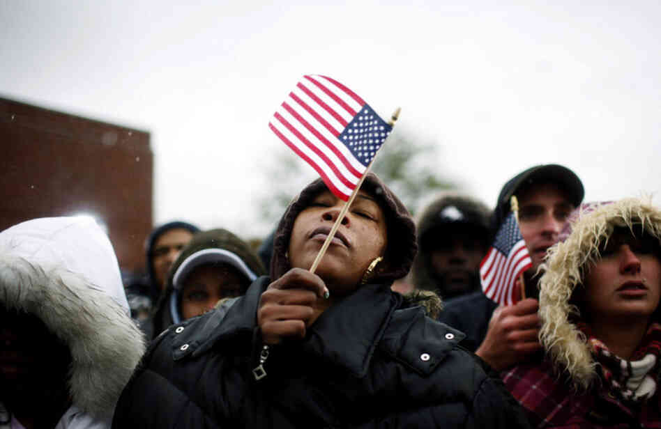 Rapt but cold Obama supporters at a campaign rally at Widener University in Chester, Pa.