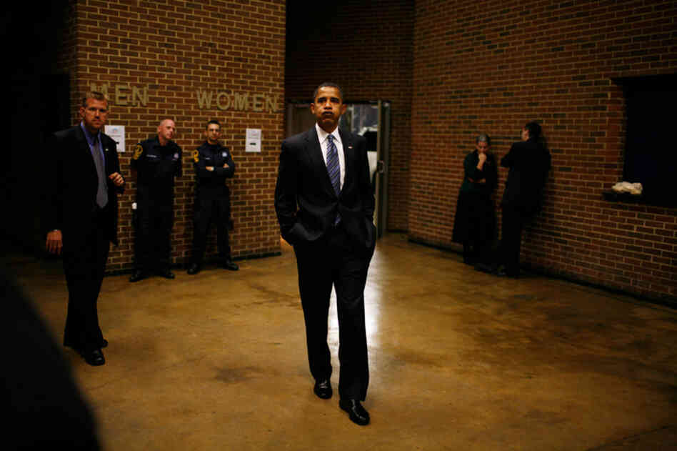 Obama waits backstage before a rally at the Richmond Coliseum in Richmond, Va.