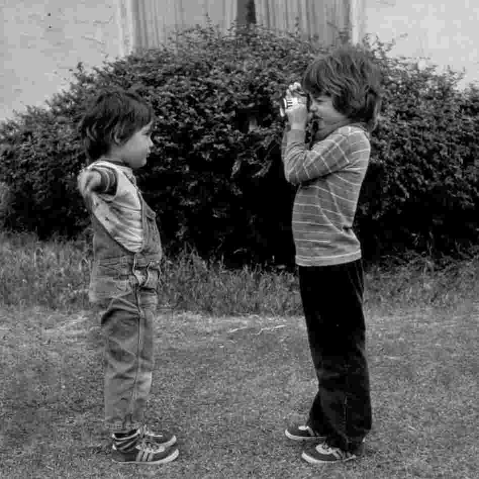 Picture taking and posing. Maternal portraits of children also appear frequently.
