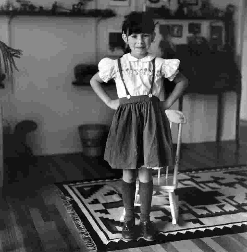 Julia with hands on hips, circa 1982.  Leonard's portfolio is also largely a reflection on what it has meant to be a single mother from the 1970s onward.