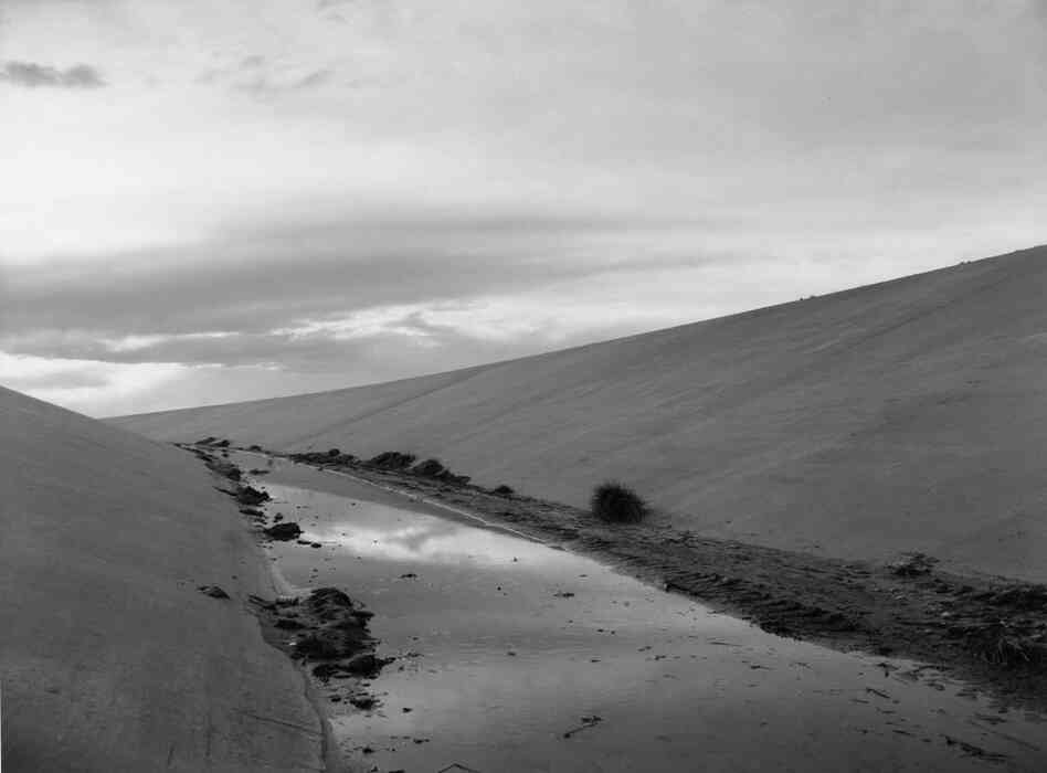 Irrigation Canal, Albuquerque, N.M., 1974, by American photographer Frank Gohlke