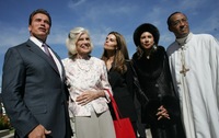 Shriver appears with her son-in-law, California Gov. Arnold Schwarzenegger and daughter Maria Shriver, as well as Rachel Murph and Frederick Murph, pastor of Brookings Community AME Church in Los Angeles on Nov. 5, 2006.