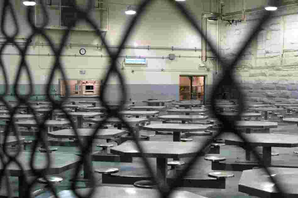 In the cafeteria where Cash performed, the walls are now chipping and the tables and benches are bolted to the floor. An armed guard is posted in the corner. 