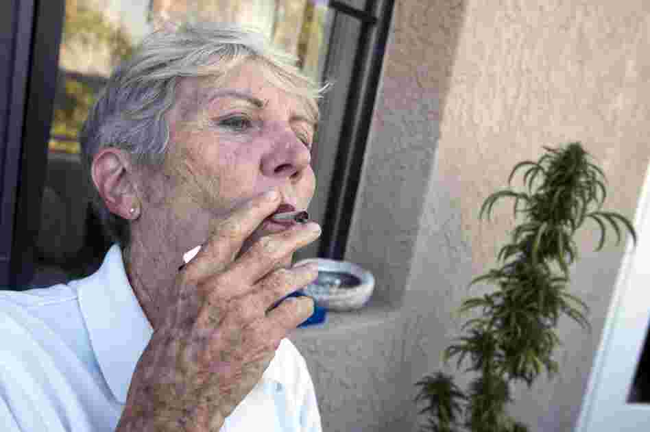 Before heading off to swim practice, Bouer smokes a joint filled with cannibis she's grown.