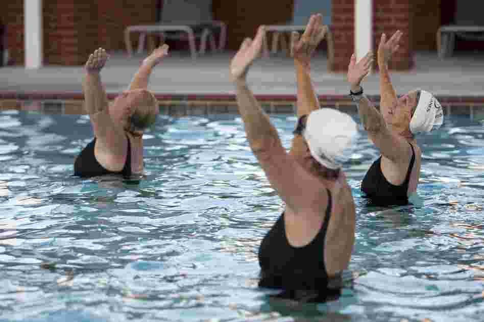Despite having to rely on a cane and a walker to get around, Bouer is a star in the water.