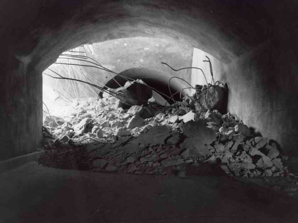 A sandstone pillar collapsed next to one of Zion Tunnel's windows in 1958, breaking off the top of the window, filling the roadway with tons of debris and closing the tunnel for several weeks. Credit: Carl E. Jepson