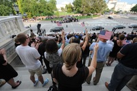 People gather on the steps of the Capitol to honor Sen. Edward Kennedy.