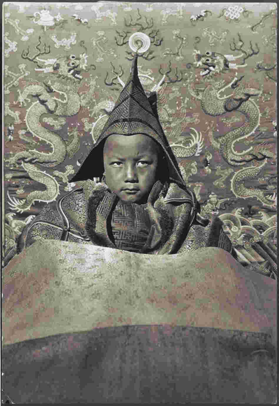 Tsemoling, The Boy God of Choni, Tibet. A farmer's son was declared by the Dalai Lama to be the reincarnation of the Tibetan king. This photograph was published in the November 1928 issue of National Geographic magazine. 