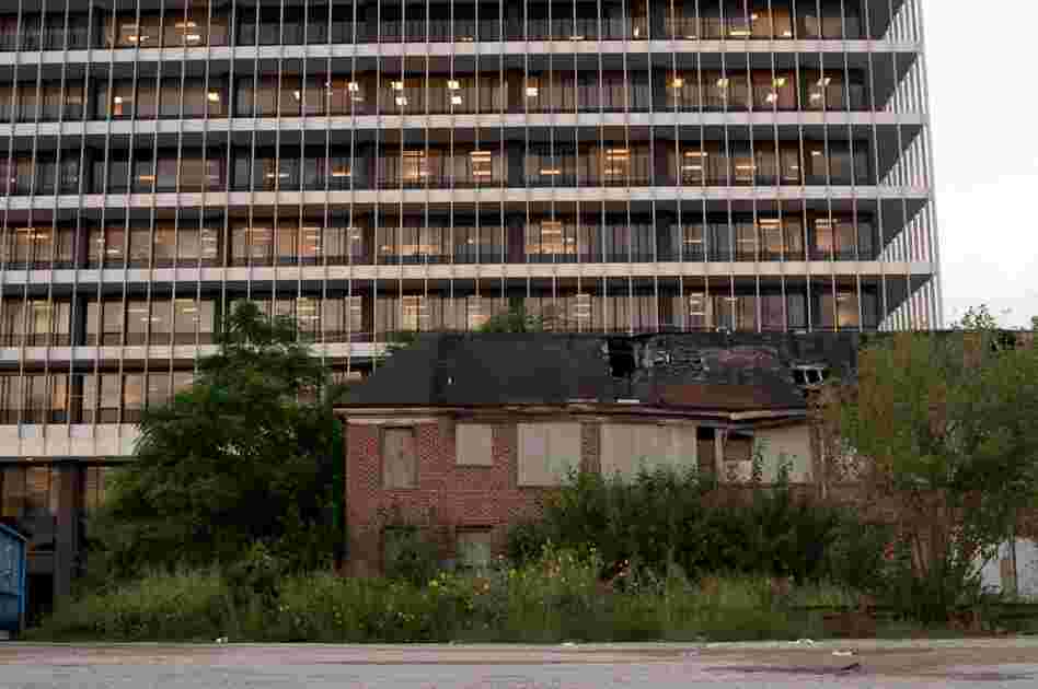 An abandoned house remains standing in a redeveloped area on the western edge of the Third Ward.