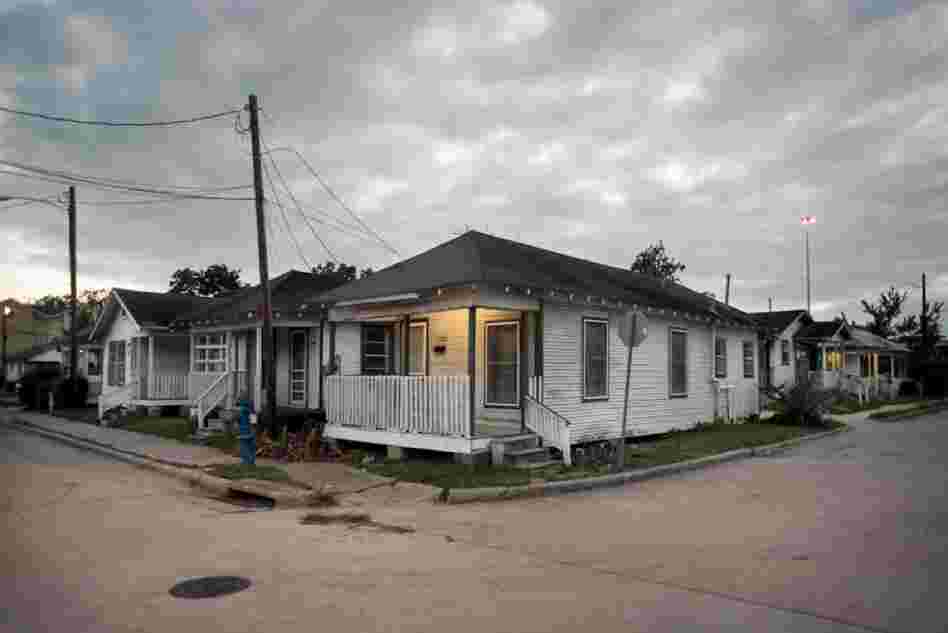 "Shotgun houses" were built with all the rooms in a row, so that breezes could pass through and take the edge off the Texas heat.