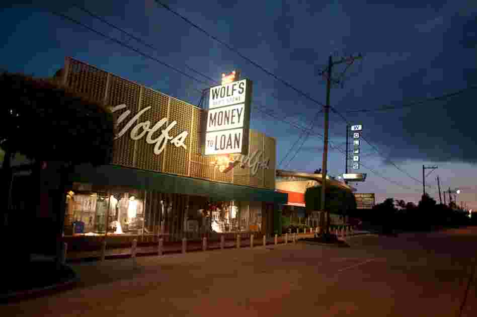Successful businesses, like Wolf's Department Store & Pawn shop, can still be found on Dowling Street.
