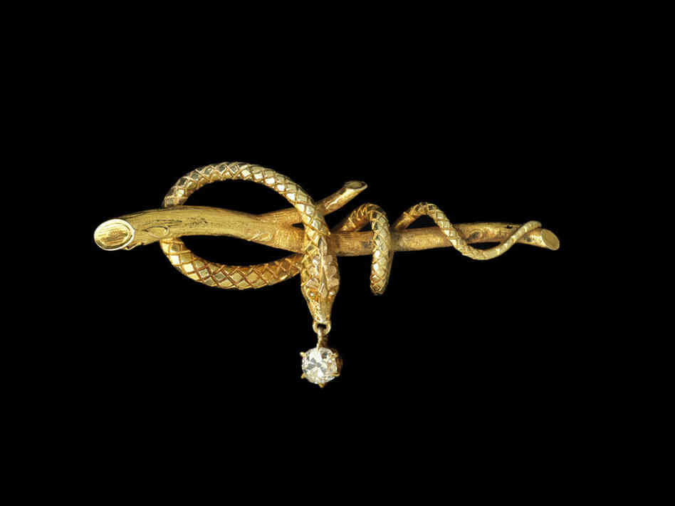 Serpent, Designer Unknown (USA), c. 1860 - For former Secretary of State Madeleine Albright, using pins as a tool of diplomacy started in 1994, when she was the U.S. ambassador to the United Nations.  Then-President Saddam Hussein of Iraq called her a serpent.  When meeting with Iraqi officials later that year, she wore this antique snake pin as a way to send a message.