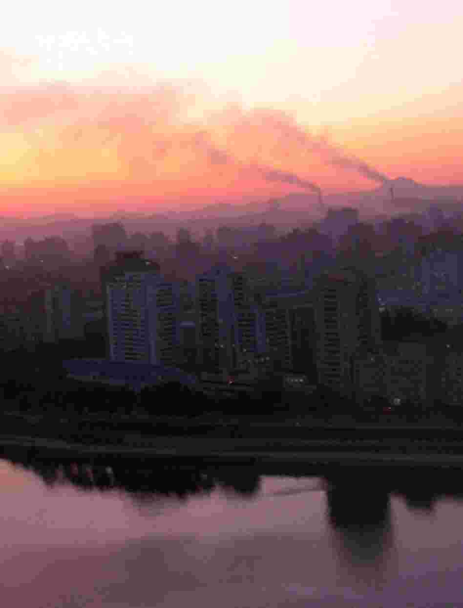 North Korea is one of the least-visited countries in the world. Here, the sun sets over Pyongyang. 