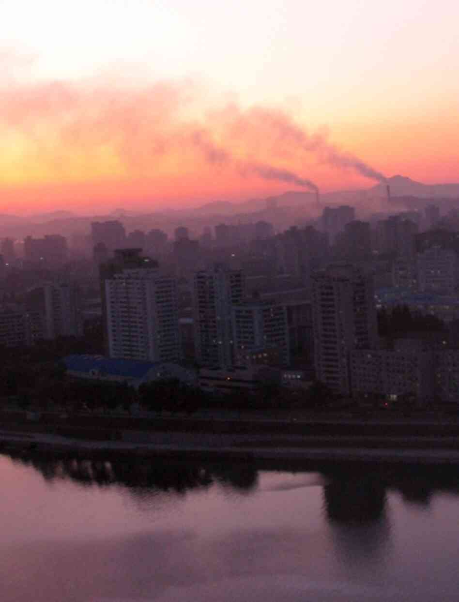North Korea is one of the least-visited countries in the world. Here, the sun sets over Pyongyang. 