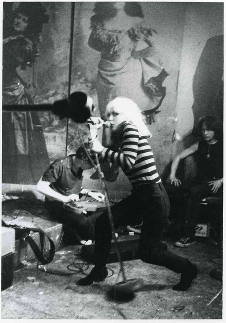 Blondie band members (from left) Chris Stein and Debbie Harry, with roadie Michael Sticca, CBGB, New York City, 1977 
