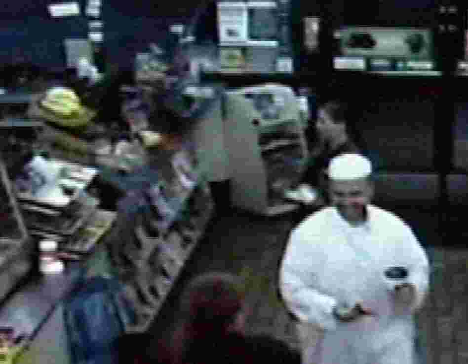 A frame grab from a security video shows suspected shooter Maj. Nidal Malik Hasan in a convenience store in Killeen, Texas, early Thursday morning, before the attack. Hasan, an Army psychiatrist, was unconscious and on a ventilator Friday, contrary to early reports that he had been killed. 