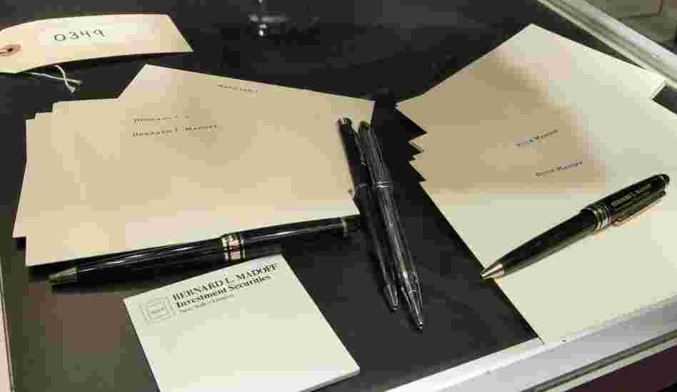 The personalized paper stationery of Bernard Madoff and his wife Ruth Madoff, along with pens showing the logo "Bernard L. Madoff Investment Securities." 