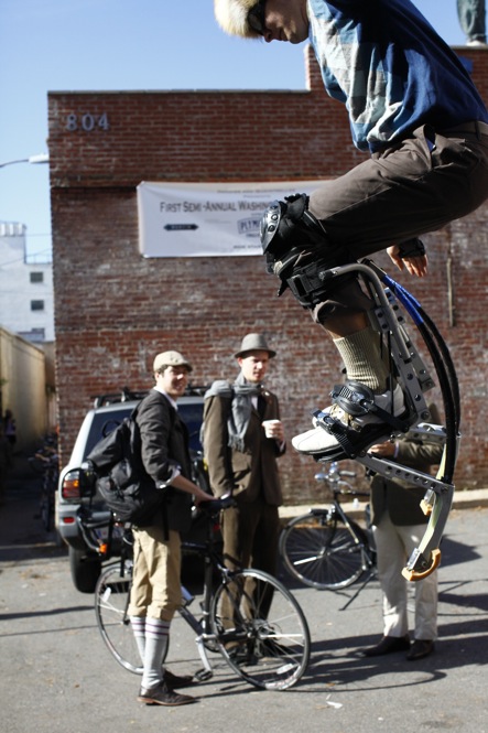 This fellow had no trouble keeping up with the riders in his special jumping gizmo. 