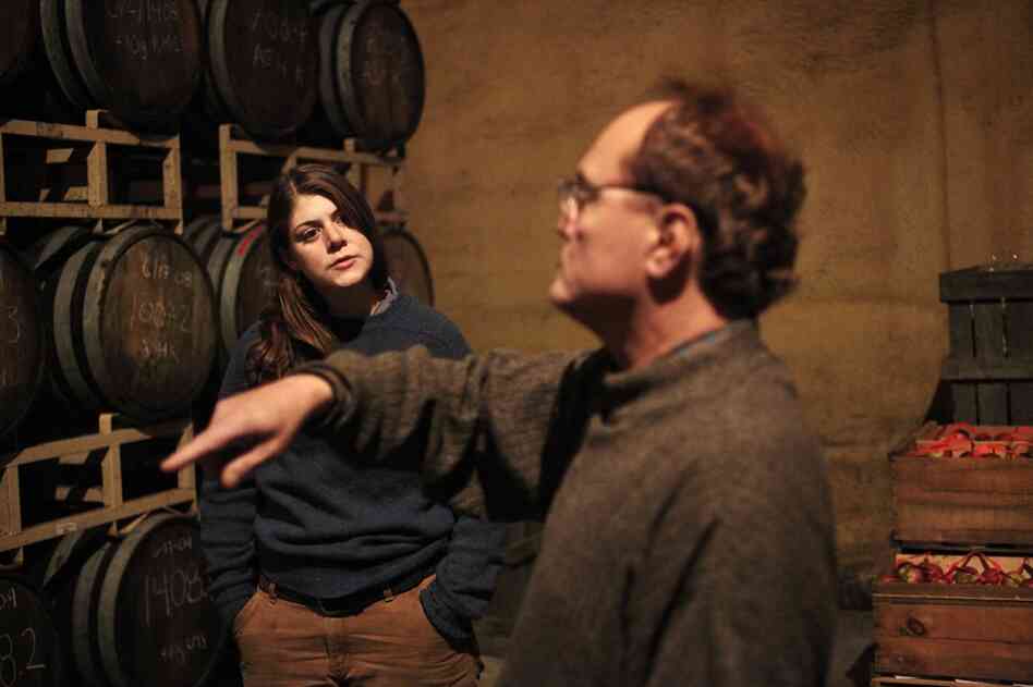 Ted Fondulas asks Saturley questions about the cider-making process, which takes about 14 months. Fondulas and his wife, Linda, who own a restaurant in Killington, Vt., were interested in carrying the cider.