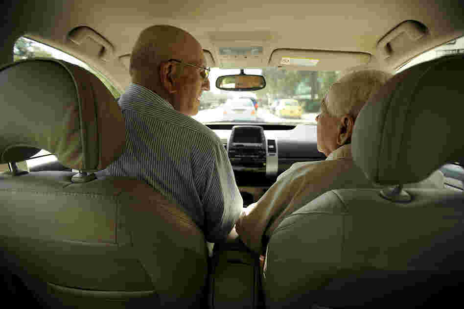 Seymour keeps the conversation light and friendly when driving passengers around the neighborhood. Here, he chats with ITN client William Gruner, 83, as they prepare to drive to a doctor's appointment.